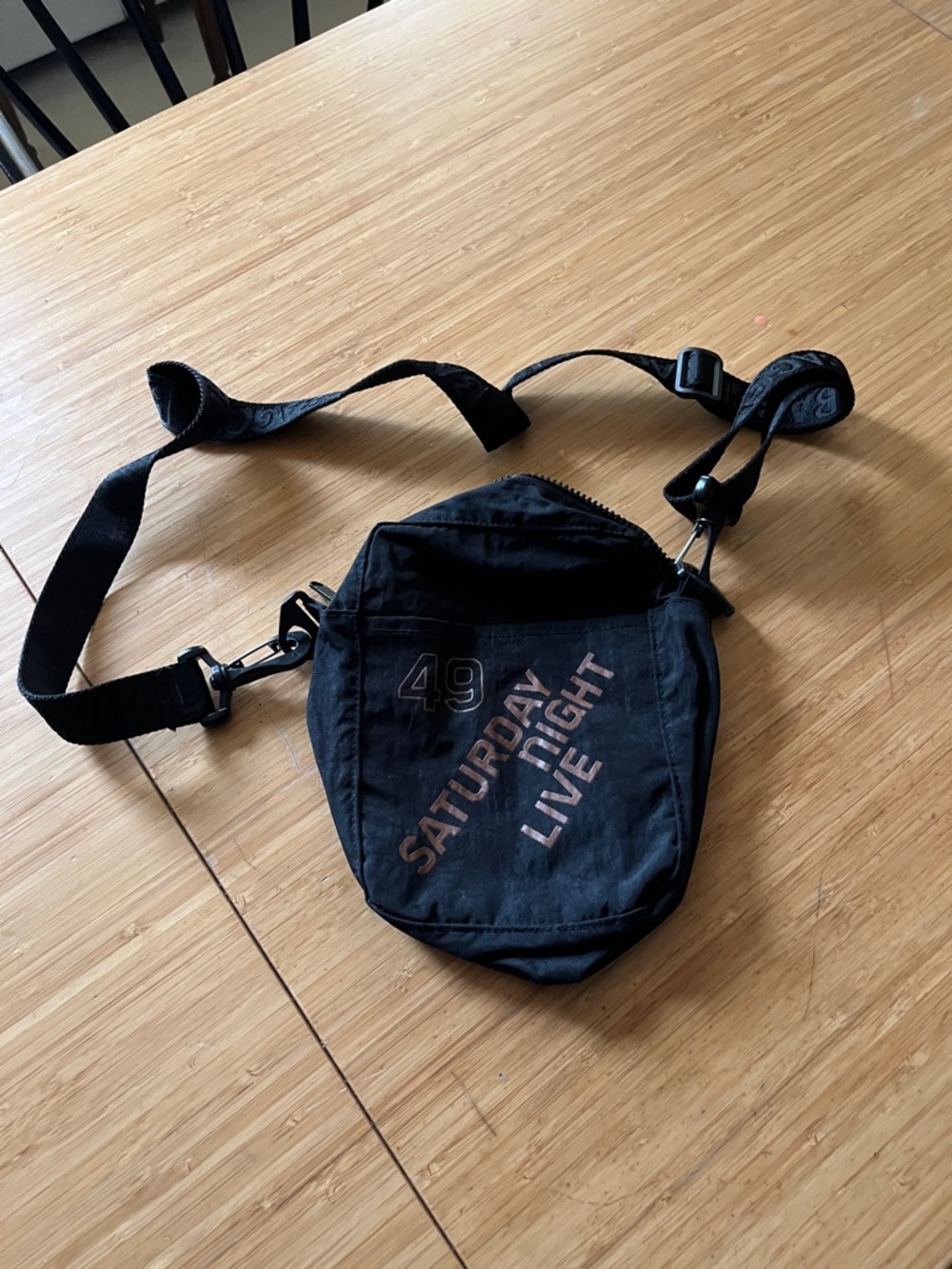BAGGU Black Crossbody Sling Bag with 'Saturday Night Live' Graphic